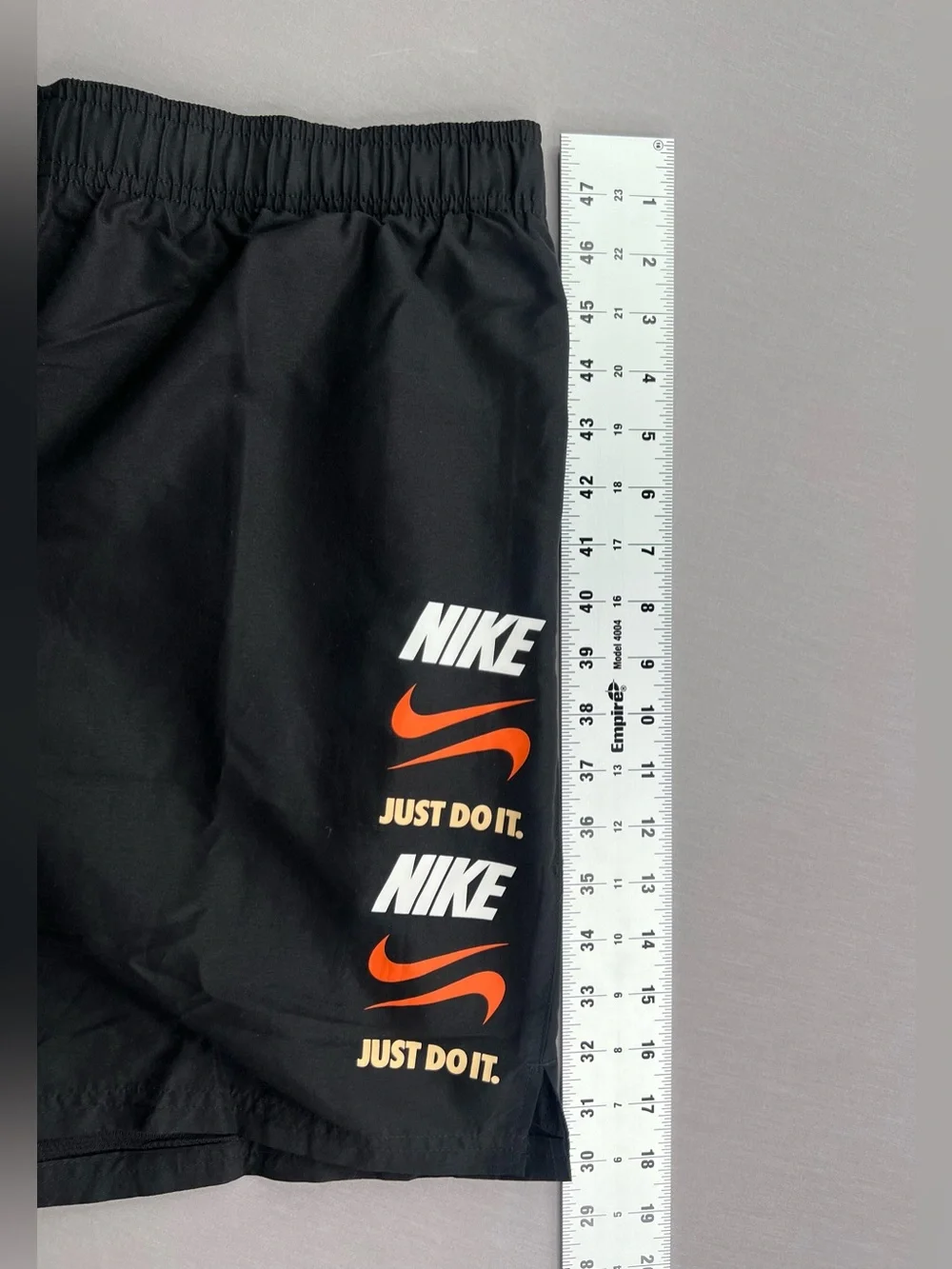 NIKE MENS STACK LOGO 7” LIGHTWEIGHT MESH LINED VOLLEY SWIM TRUNKS